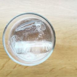 High angle view of coffee in glass on table