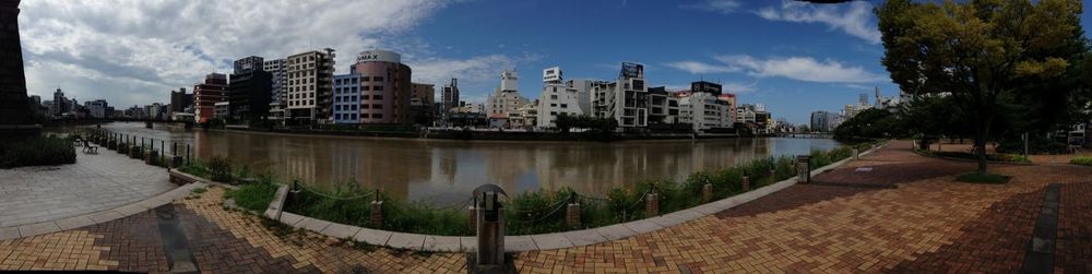 View of river with buildings in background