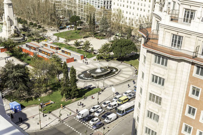 High angle view of traffic on city street against buildings