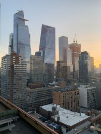 View of hudson yard buildings in new york city against morning sky