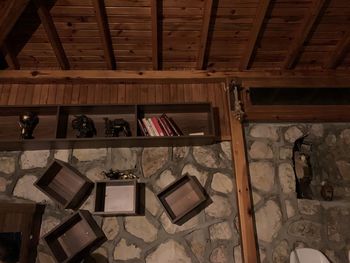 High angle view of books on shelf at home