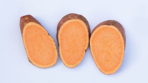 Close-up of bread against white background