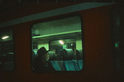 People in train at night