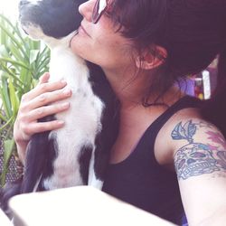 Midsection of woman with cat