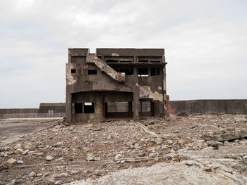 Abandoned built structure against sky