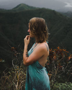 Woman standing on field