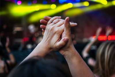 Cropped image of woman holding hands