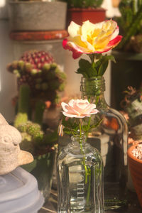 Close-up of flower vase on table