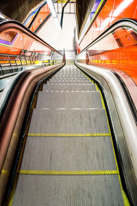 Low angle view of escalator in subway station