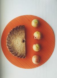 High angle view of apples in plate on table