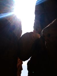 Low angle view of rock formation against sky