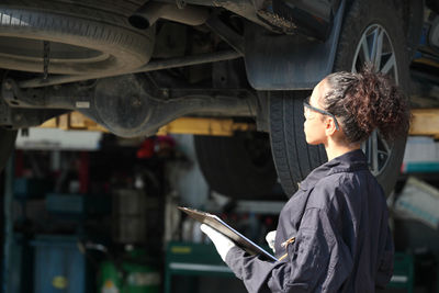 Man working in car