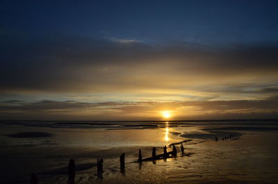 Scenic view of sunset over sea