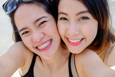 Portrait of sisters smiling