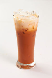 Close-up of coffee cup against white background