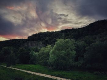 Scenic view of landscape against sky during sunset