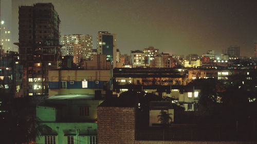 View of illuminated buildings at night