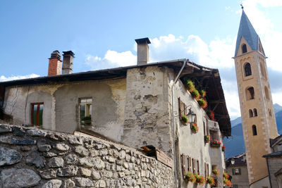 Low angle view of old building against sky