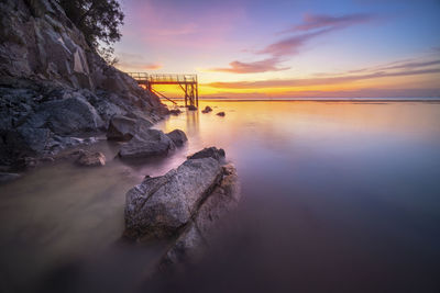 Scenic view of sea against sky during sunset