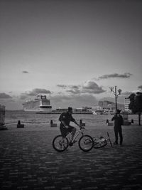 People on bicycle in city