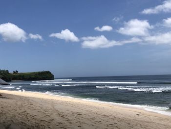 Scenic view of beach against sky