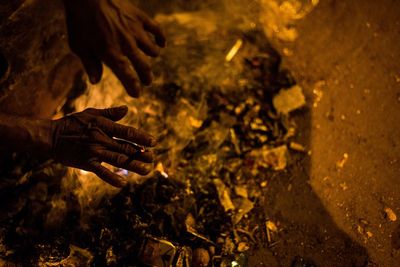 Close-up of male hand holding cigarette