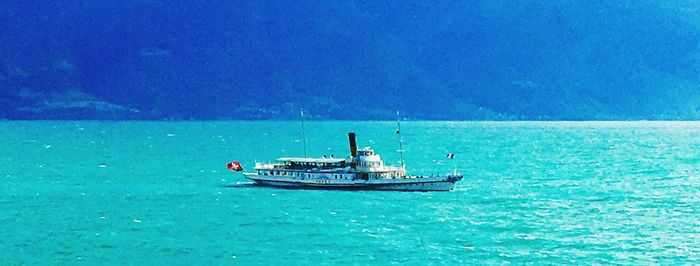 Boat sailing in sea