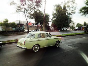 Cars on road in city