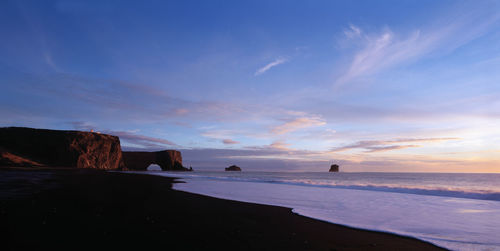 The black sand beach at the arch dyrhólaey in south iceland