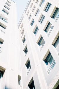 Low angle view of office building against sky