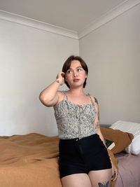 High angle view of cute girl playing with toy at home