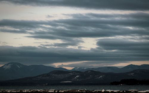 Scenic view of mountains against sky during sunset