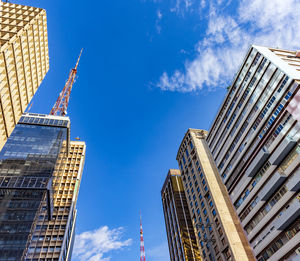 Low angle view of skyscraper against sky