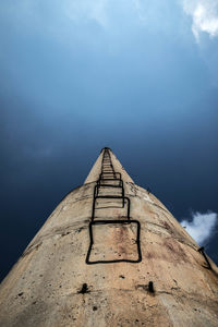 Low angle view of old tower against sky