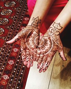 Close-up of woman hand with tattoo