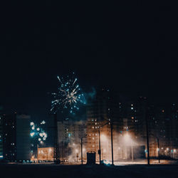 Firework display at night