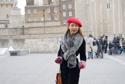 Portrait of a smiling young woman in winter