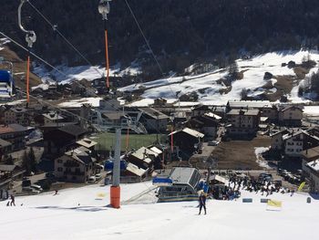 Houses on snow covered field