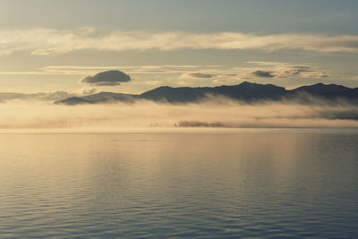 Scenic view of sea against sky during sunset