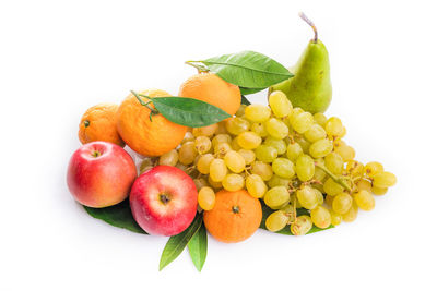 Close-up of apples and fruits on white background