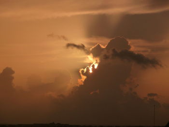 Low angle view of dramatic sky during sunset