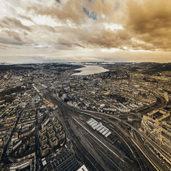 High angle view of city and buildings against sky