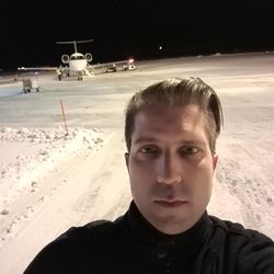 Portrait of young man at airport