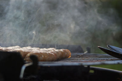 Close-up of meat on barbecue grill