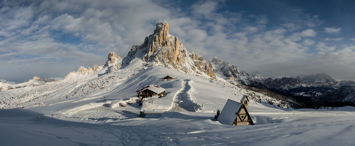 Scenic view of snowcapped mountains against sky