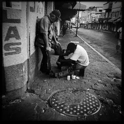 People on street in city