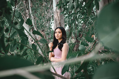 Young woman sitting outdoors