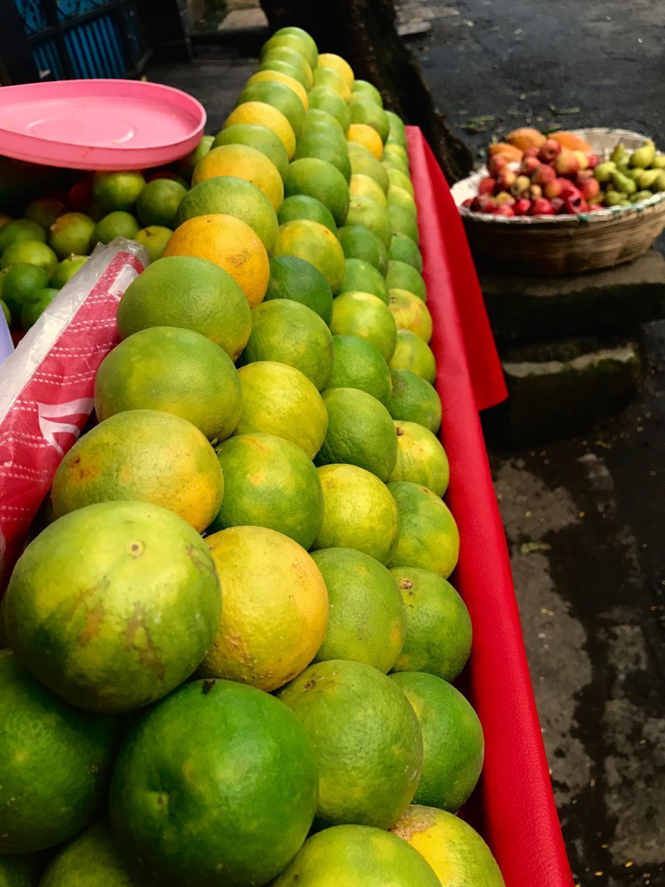 HIGH ANGLE VIEW OF FRUITS AT MARKET STALL