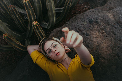 High angle view of young woman hand