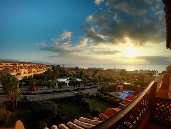 High angle view of townscape against sky during sunset